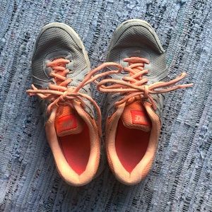 Well worn Nike running shoes